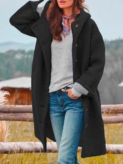 Women's longline textured hooded coat with button front and side pockets