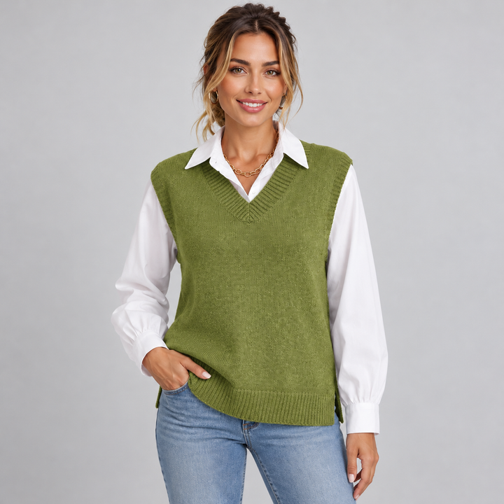 Women's sleeveless textured knit V-neck sweater vest layered over a collared shirt