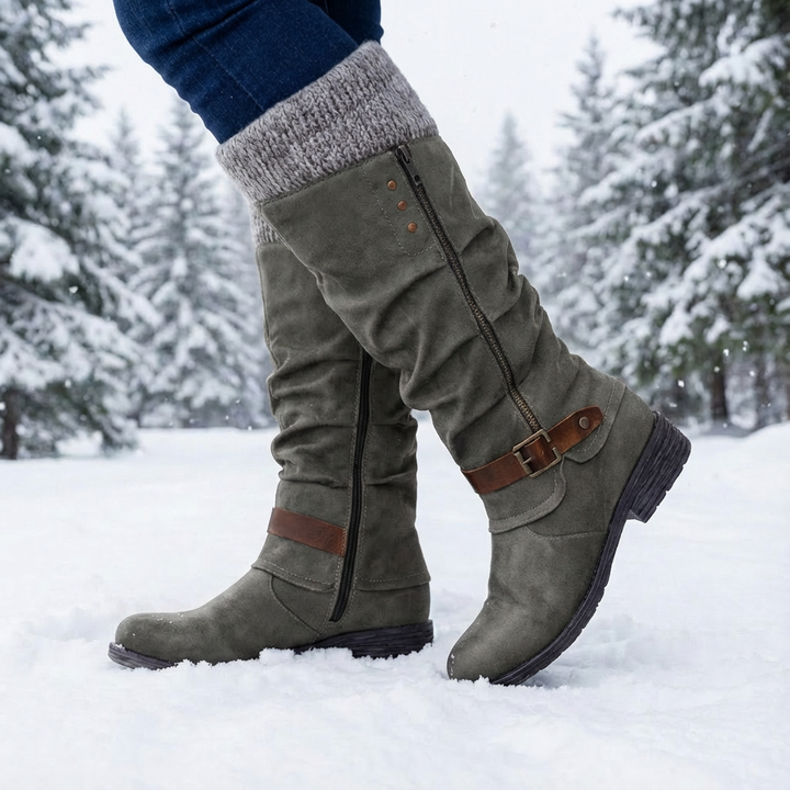 Women's knee-high boots with side zippers, buckle straps and ribbed cuffs