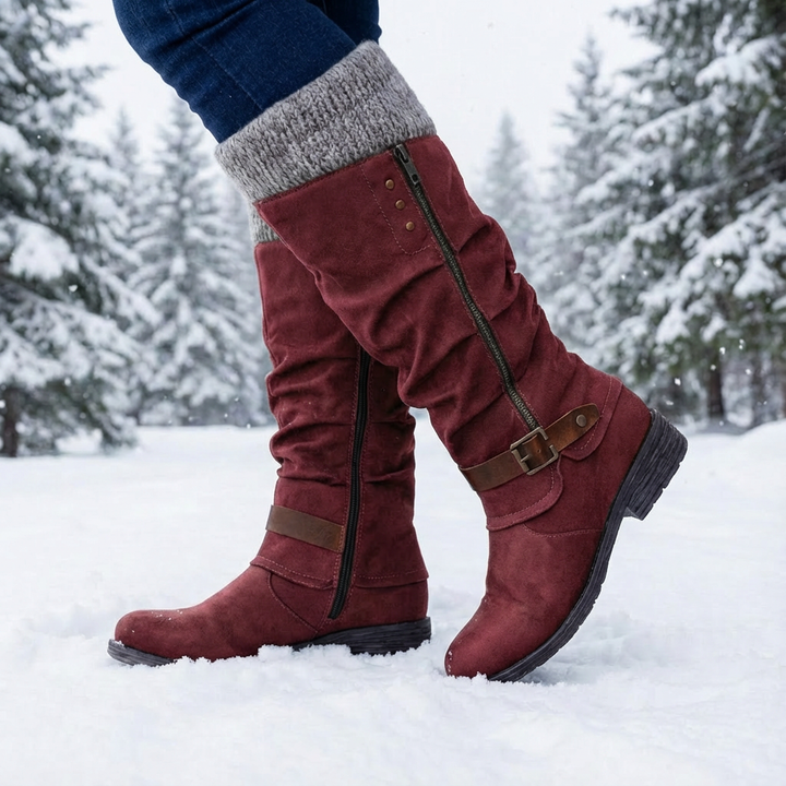 Women's knee-high boots with side zippers, buckle straps and ribbed cuffs
