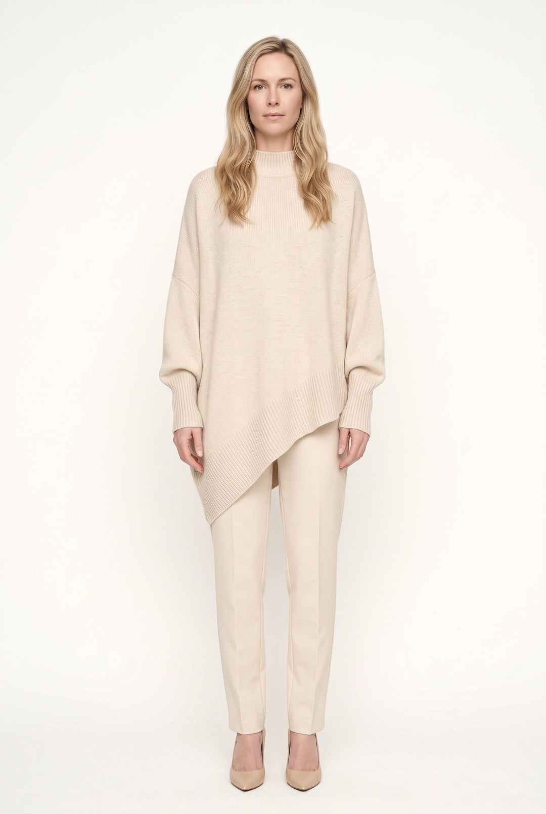 Women's oversized turtleneck sweater with long sleeves and asymmetric hem