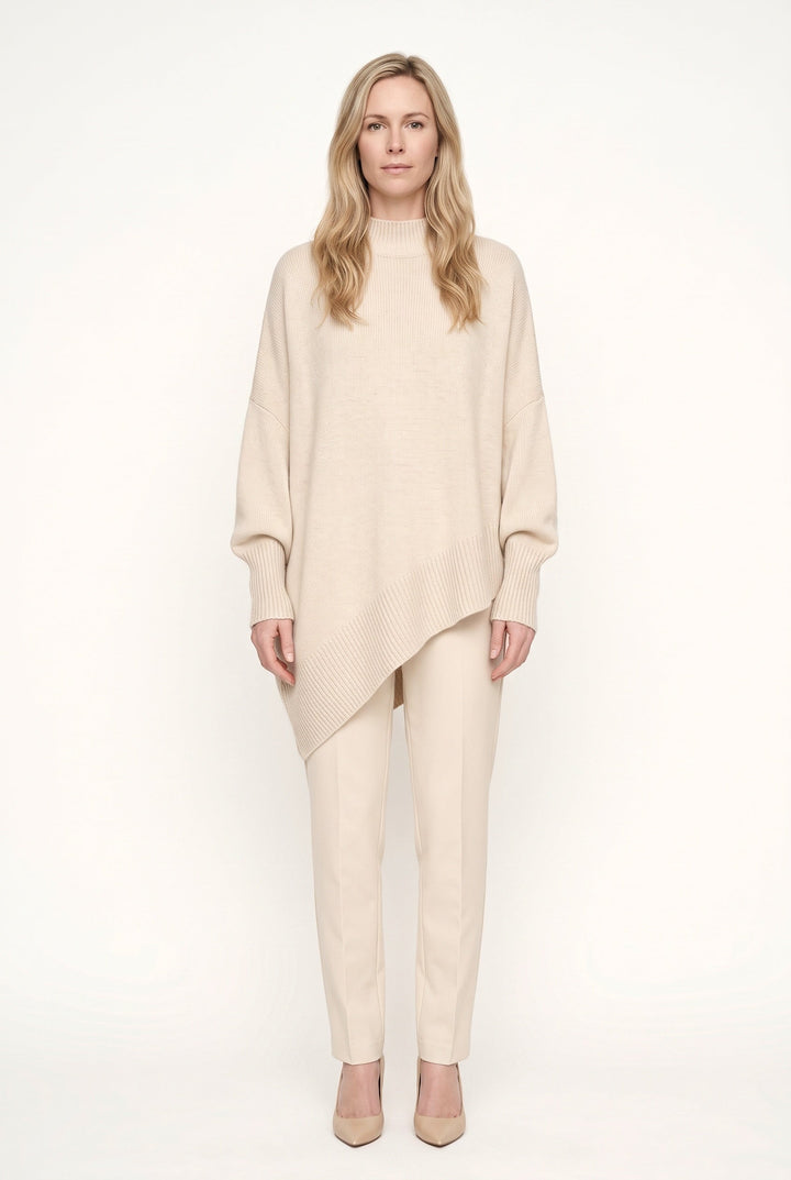 Women's oversized turtleneck sweater with long sleeves and asymmetric hem