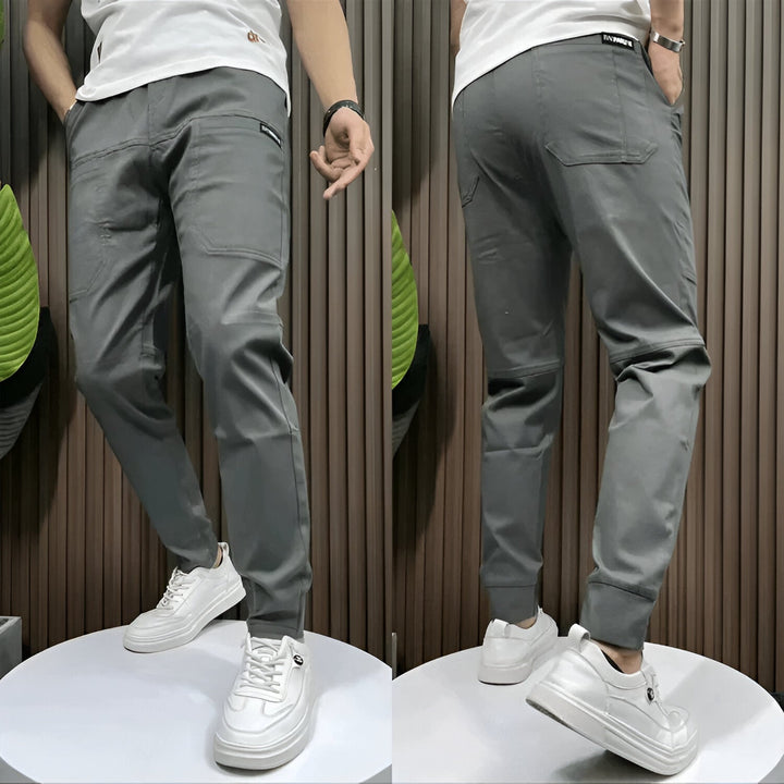 Unisex tapered cargo trousers with side pockets and ankle cuffs