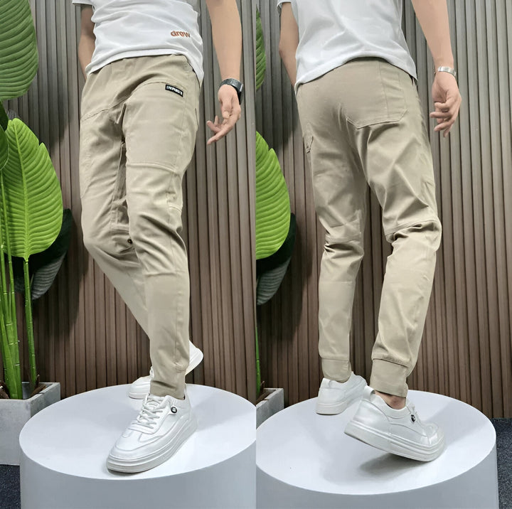 Unisex tapered cargo trousers with side pockets and ankle cuffs