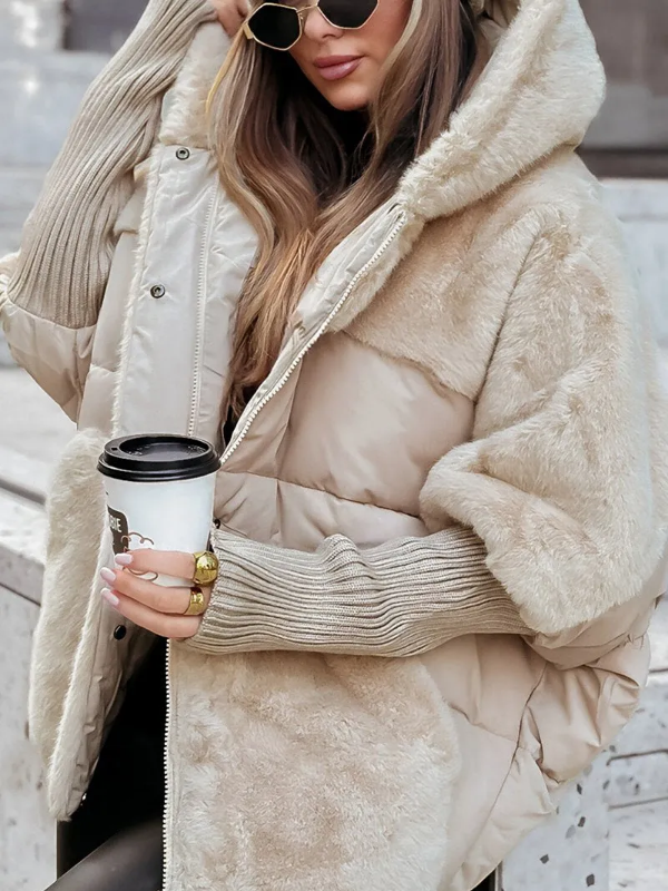Women's hooded quilted puffer jacket with faux fur trim and ribbed cuffs