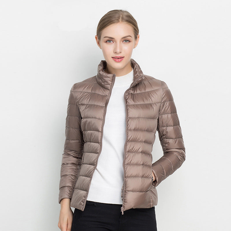 Women's quilted puffer jacket with stand collar and long sleeves
