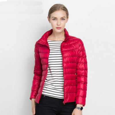 Women's quilted puffer jacket with stand collar and long sleeves