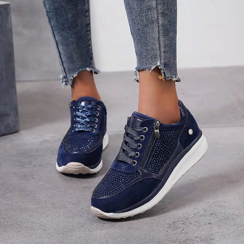 Women's low-cut lace-up sneakers with perforated panels and contrasting soles