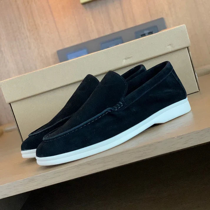 Women's suede-finish slip-on loafers with rounded moc toes and contrasting flat soles