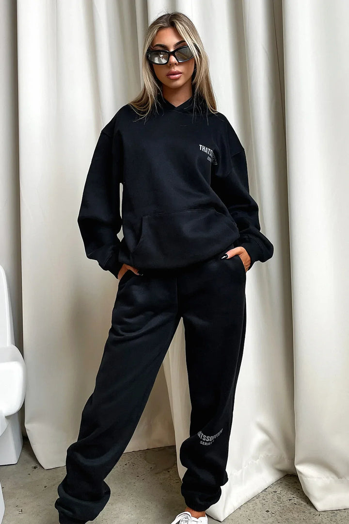Women's black hooded sweatshirt with white chest graphic text
