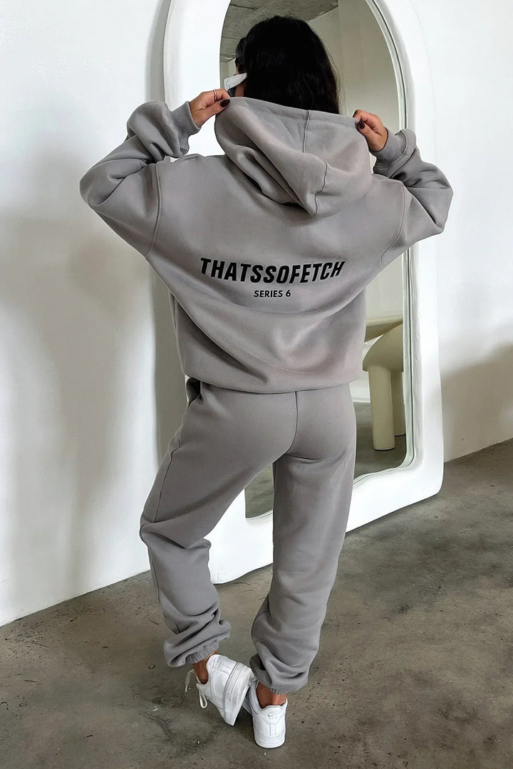 Women's grey hooded sweatshirt with long sleeves, front logo and ribbed trims
