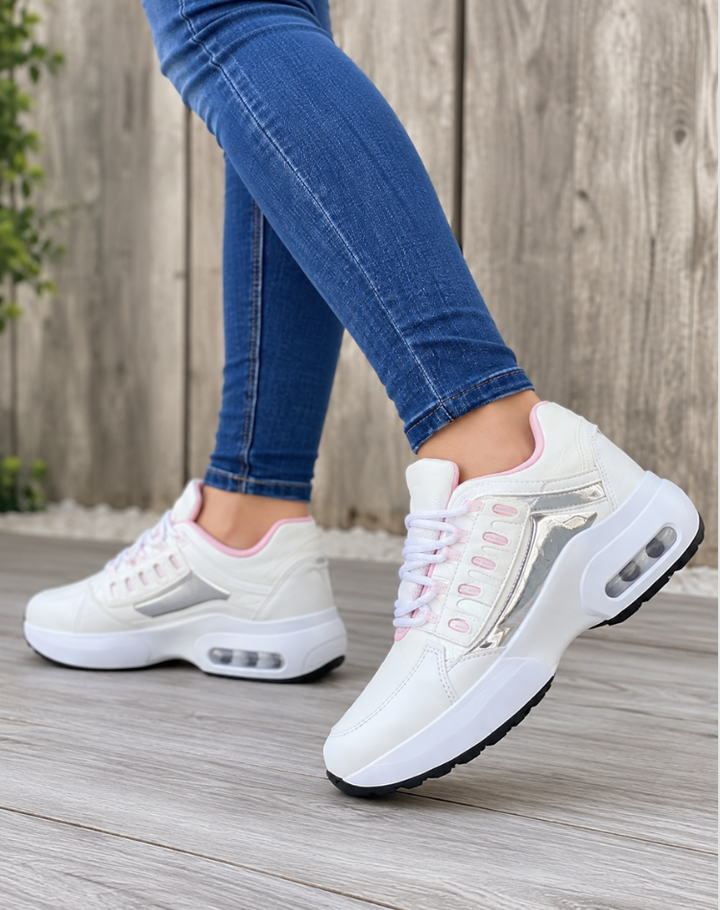 Women's low-top lace-up sneakers with layered panels and chunky sculpted soles