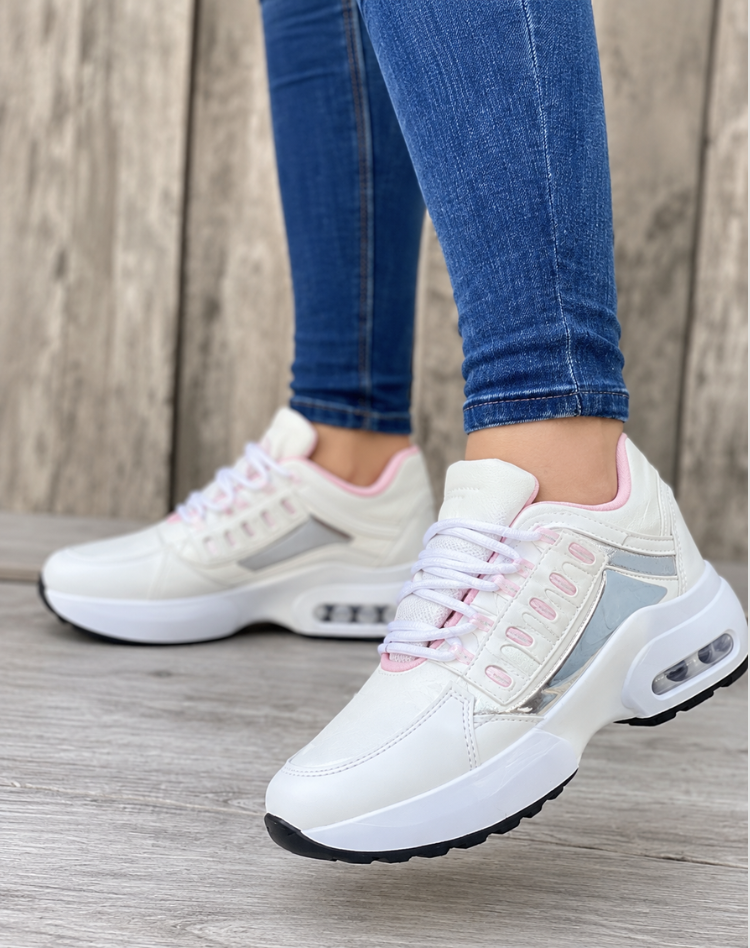 Women's low-top lace-up sneakers with layered panels and chunky sculpted soles