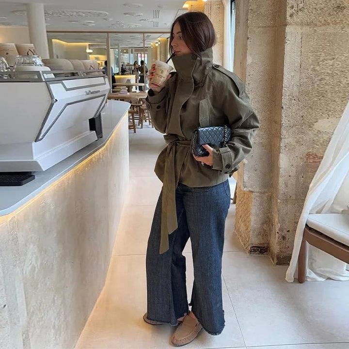 Women's olive belted trench coat with high collar and long sleeves
