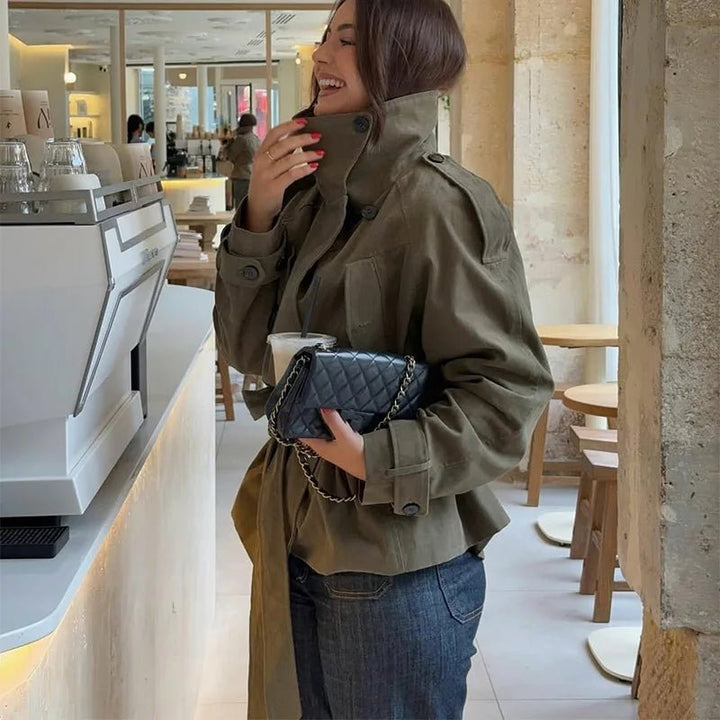 Women's olive belted trench coat with high collar and long sleeves