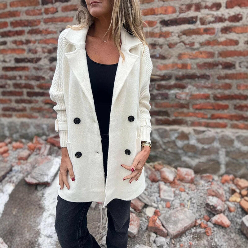 Women's double-breasted coat with long knit sleeves and buckle cuff details
