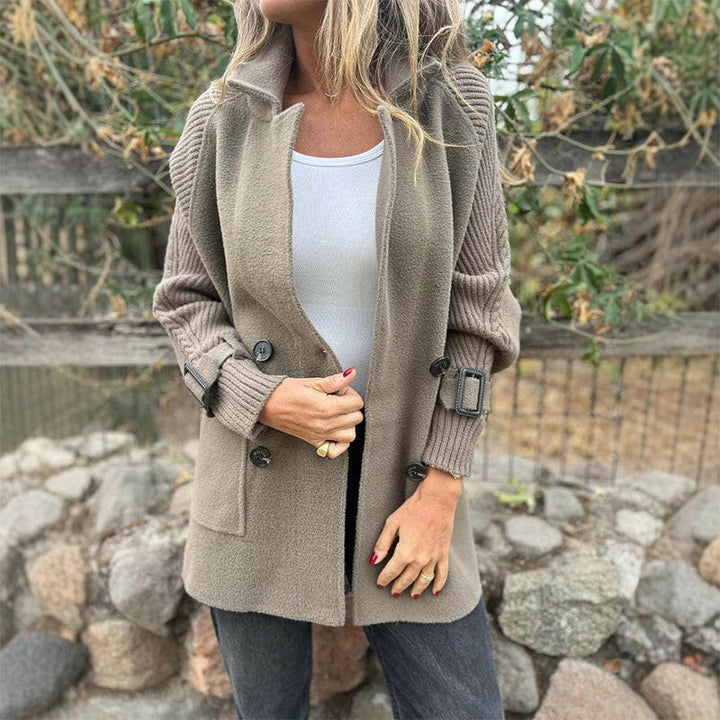 Women's double-breasted coat with long knit sleeves and buckle cuff details