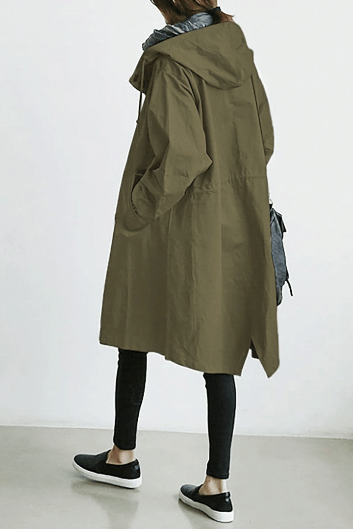 Women's long hooded button-front raincoat with side pockets