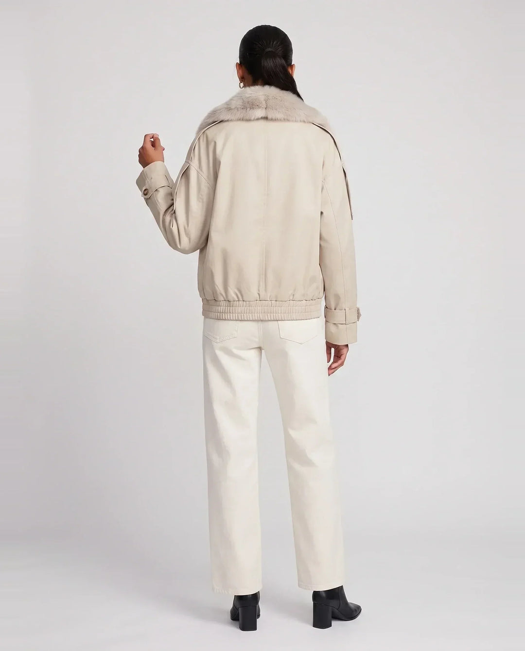 Women's beige short trench jacket with textured collar and button front