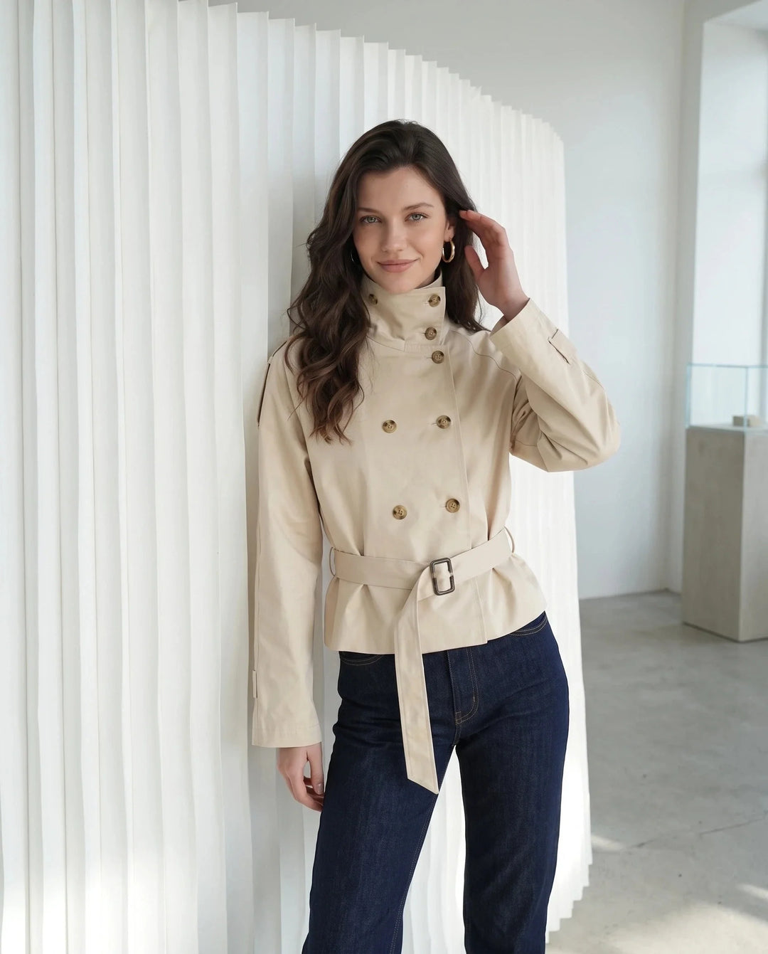 Women's short belted trench jacket with high stand collar and long sleeves