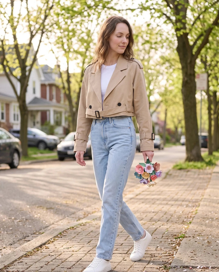 Women's beige cropped trench jacket with belt, lapels and buckle details