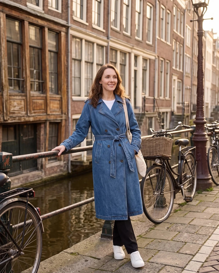Women's long double-breasted trench coat with lapels, belt and cuff straps