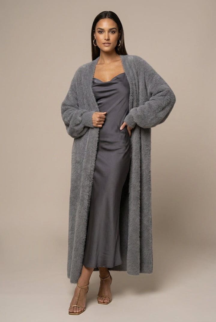 Women's long faux fur cardigan with open front and full-length silhouette