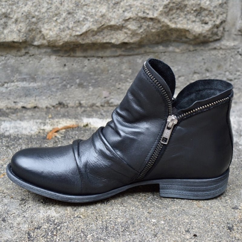 Ruched ankle boot with diagonal side zip, round toe and low heel