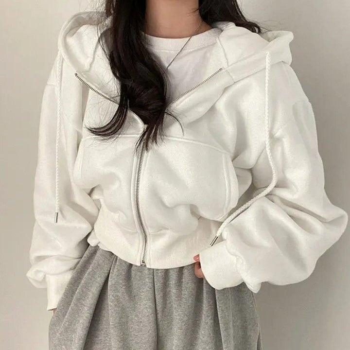 Women's cropped oversized hooded zip-up hoodie with drawstrings and front pockets