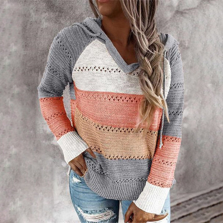 Women's striped hooded knit sweater with long sleeves and contrast panels