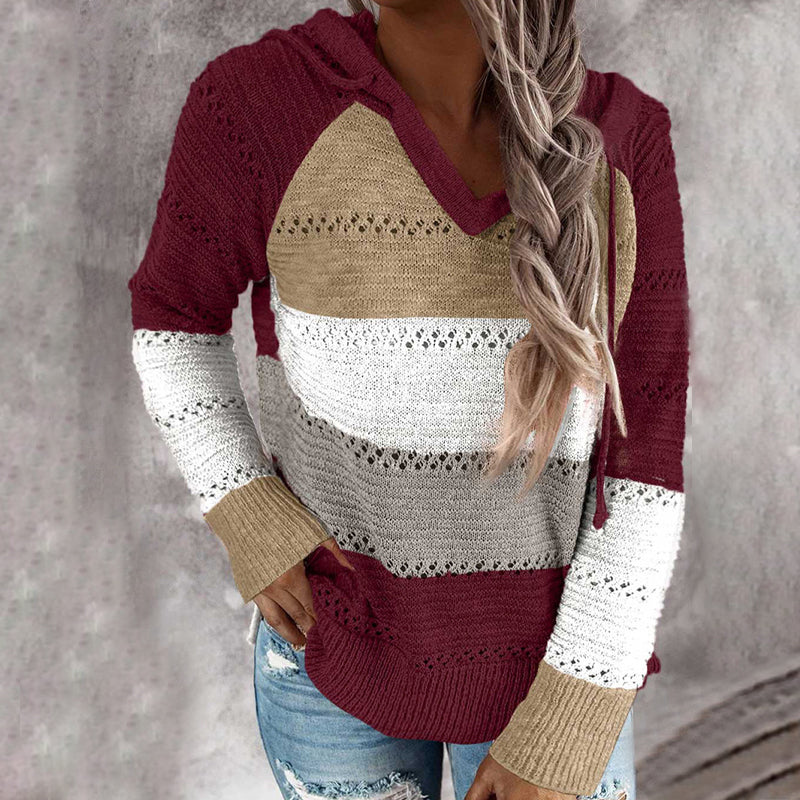 Women's striped hooded knit sweater with long sleeves and contrast panels