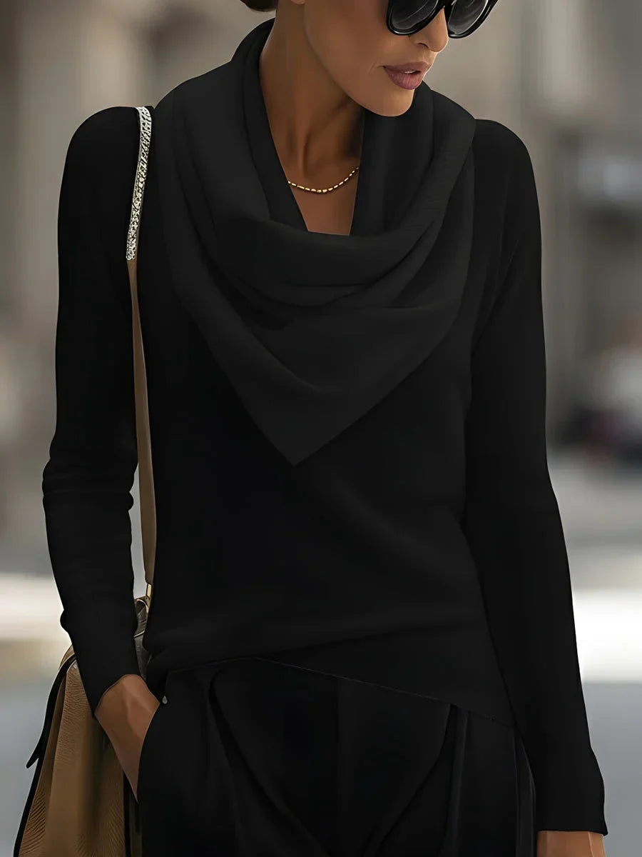 Women's knitted sweater top with a draped cowl neckline and long sleeves