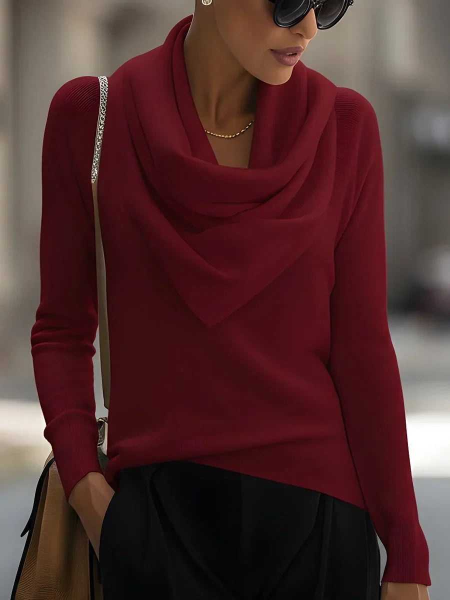Women's knitted sweater top with a draped cowl neckline and long sleeves