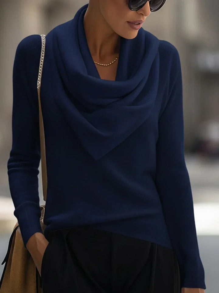 Women's knitted sweater top with a draped cowl neckline and long sleeves