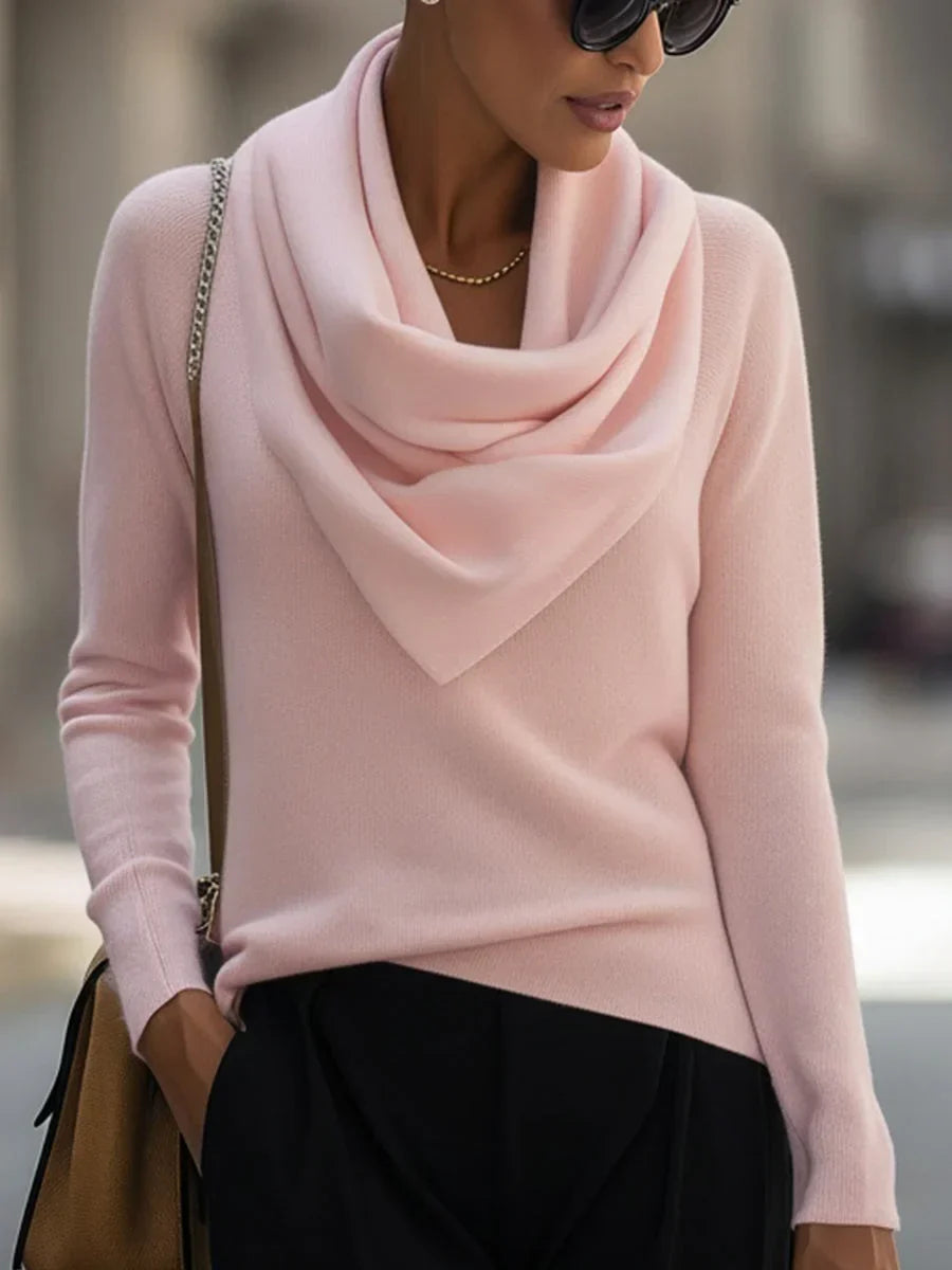 Women's knitted sweater top with a draped cowl neckline and long sleeves