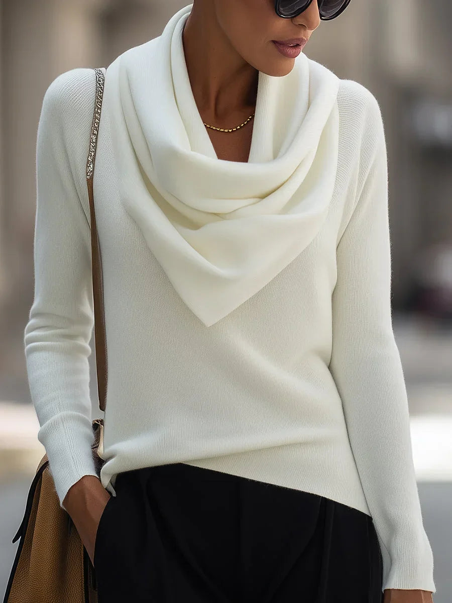 Women's knitted sweater top with a draped cowl neckline and long sleeves