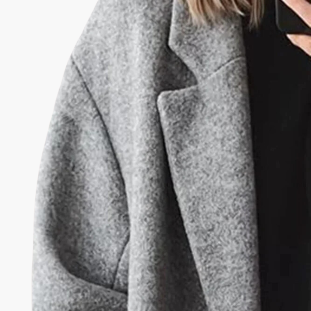 Women's longline notched lapel coat with buttons and side pockets