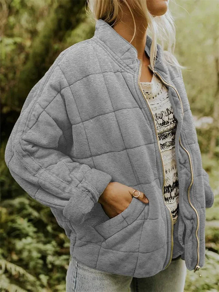 Women's quilted zip-front jacket with stand collar and front pockets