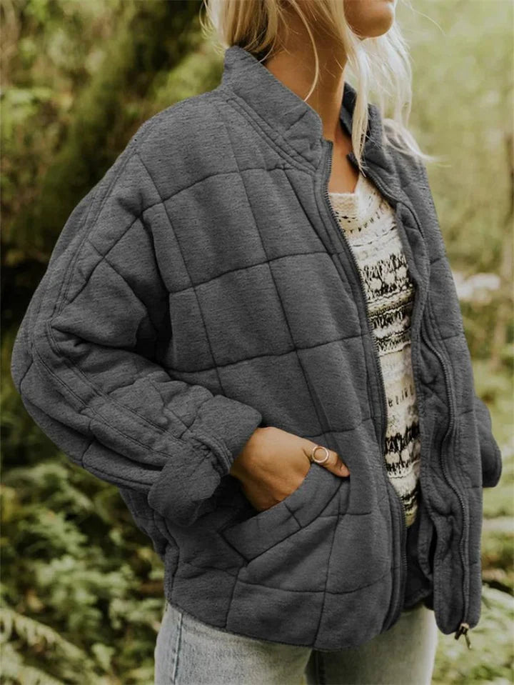 Women's quilted zip-front jacket with stand collar and front pockets