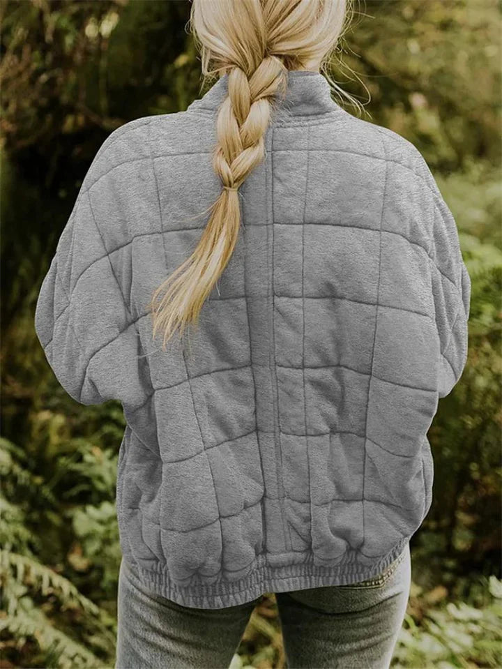 Women's quilted zip-front jacket with stand collar and front pockets