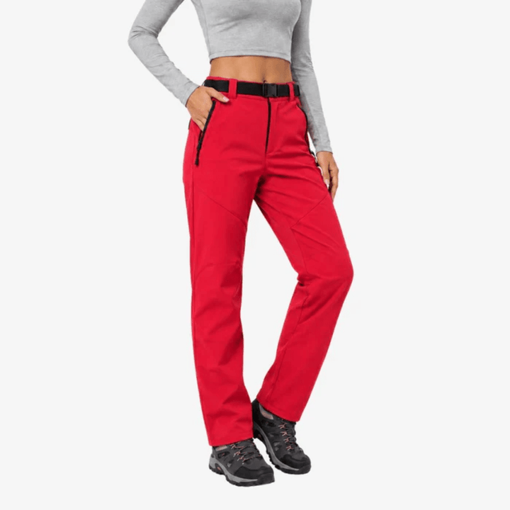 Women's full-length hiking pants with belt, zip pockets and shaped leg panels